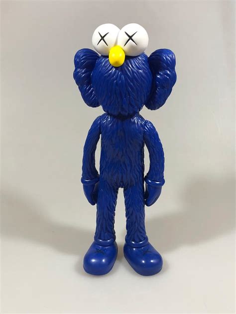 kaws replica figurines.